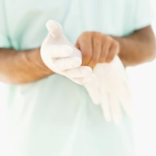 56570121_Close-up_of_a_person_putting_on_surgical_gloves-1.jpg 56570121_Close-up_of_a_person_putting_on_surgical_gloves-1.jpg