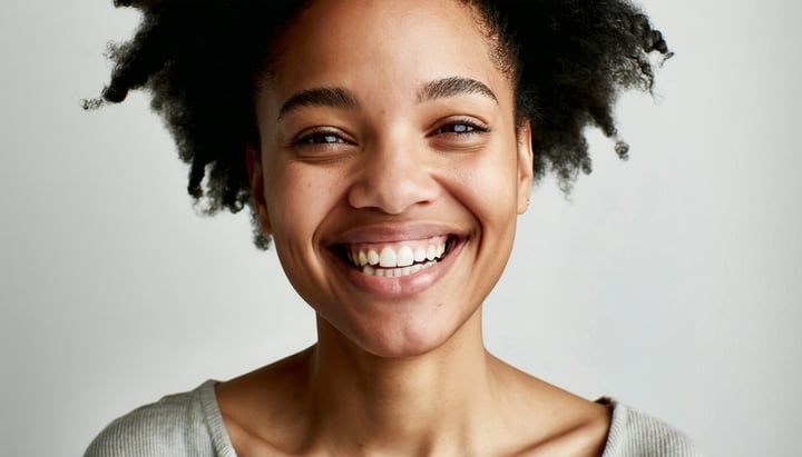a person smiling you can see their full face and their torso