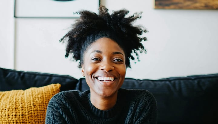 image of a happy person on a couch-1