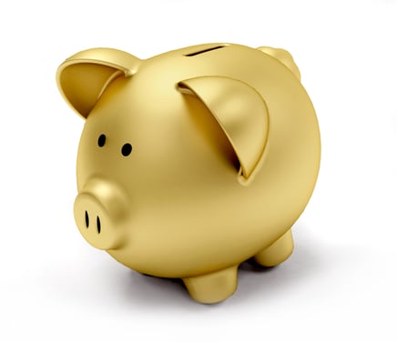 Golden piggy bank isolated over a white background