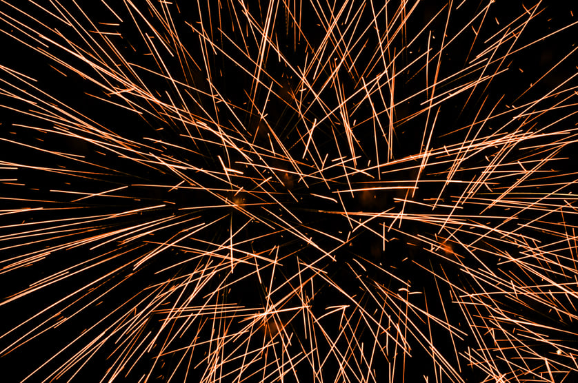 Helter-skelter light trails from one or two bursts of fireworks