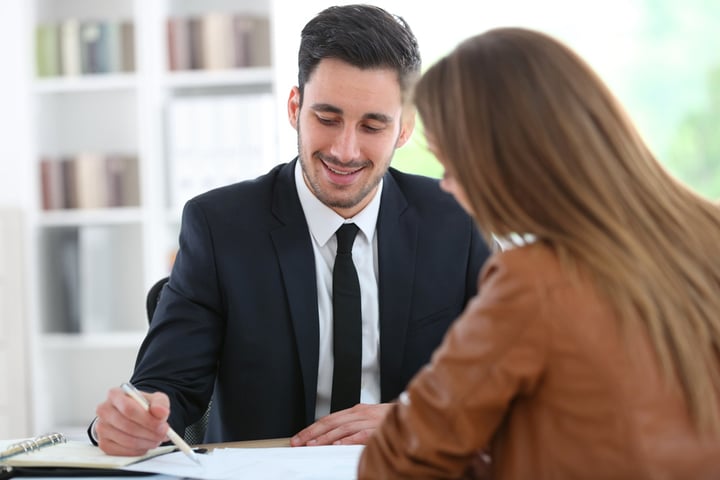 Woman meeting financial adviser in office-2