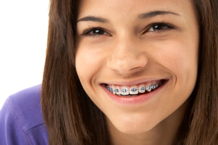 4 ways to help ease the pain of braces for kids