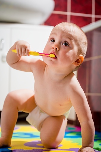 baby's first tooth arrived; now what; caring for your infant's new teeth