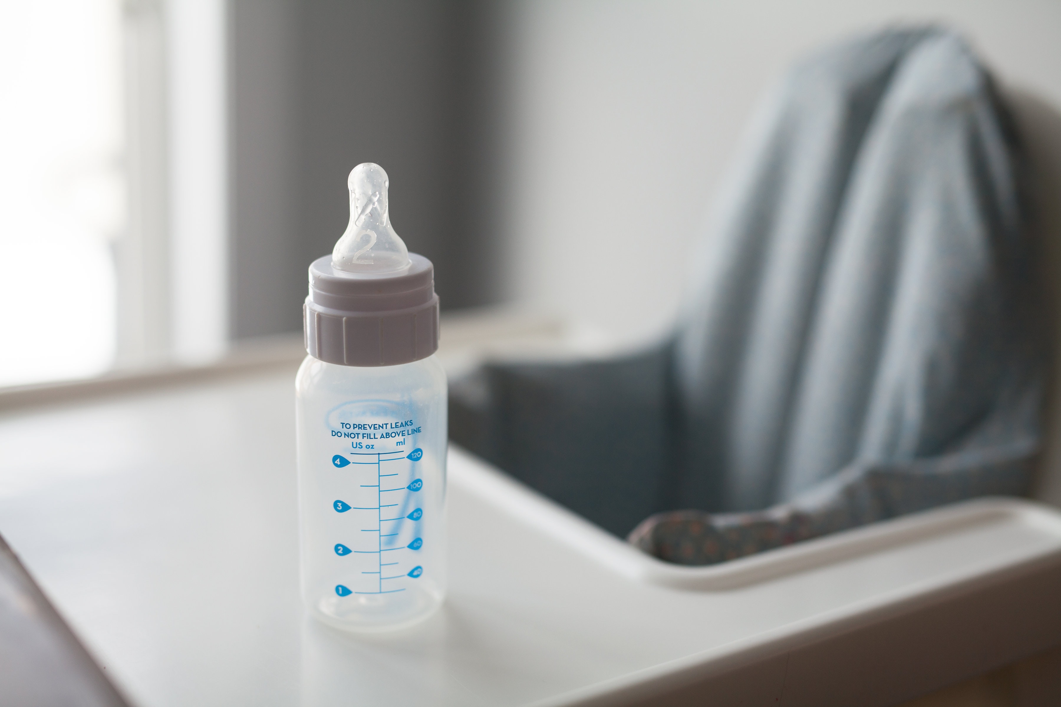 Empty baby bottle closeup