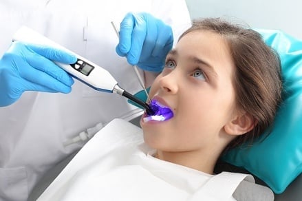 Girl-getting-a-dental-exam