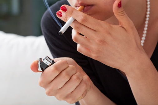 how do you hold a cigarette in your mouth Man Burning His Fingers Stock Photo 1009006942 How to Hold a Cigar: