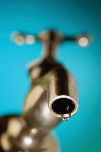 water dripping from faucet, lead in water, lead, dental health, dental and vision insurance, harmful effects of lead